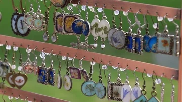 Variety of handmade earrings Stock Footage 85579509