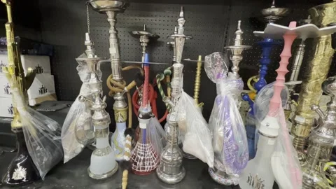 Variety of Hookah on Shelf Display 스톡 동영상 240275116