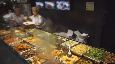 Variety of Hot Foods at a Chinese Eatery in Singapore Stock Footage
