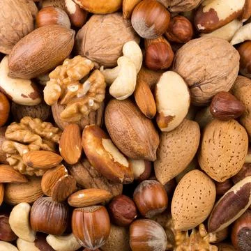 Variety of Mixed Nuts as a background - close up image Stock Photos