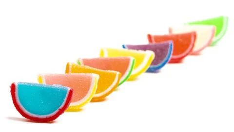 A Variety of Multicolored Candy Fruit Slice Isolated on a White Background Stock Photos