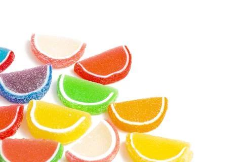 A Variety of Multicolored Candy Fruit Slice Isolated on a White Background Stock Photos