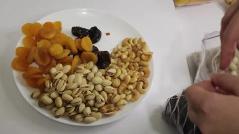 A variety of nutritious snacks are being prepared, featuring an assortment of Stock Footage 292758351