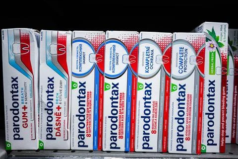 Variety of Parodontax toothpaste packaging displayed on a retail store shelf Stock Photos