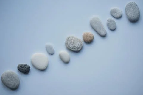 A variety of pebbles on a white background Stock Photos