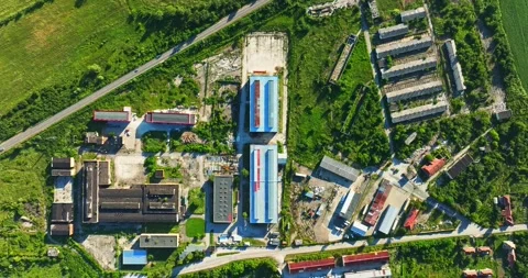 Variety Of Poorly Kept Structures Abstract Vibrant Outdoor Scene Top Down Aerial Video stock 289412804