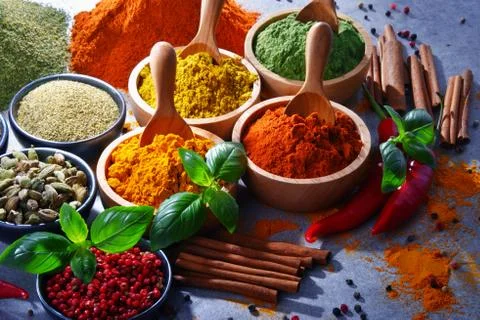 Variety of spices on kitchen table. Foto stock