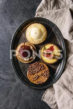 Variety of sweet tartlets Stock Photos