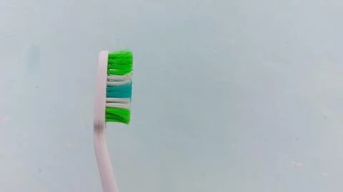 A variety of toothbrush options with different models and colors Foto stock