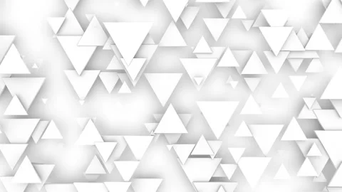 A variety of triangles move smoothly in blurry light. Seamless loop. Stock Footage 125500907