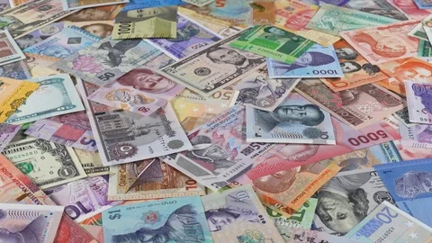 Variety world currencies notes slow rotating. World money, economy. Low angle Stock Footage