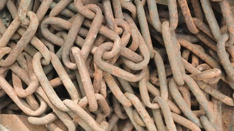 Various angles showcase a tangle of metal chains, highlighting their intricate Stock Footage 338447661