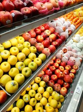 Various apples on fruit section 写真素材