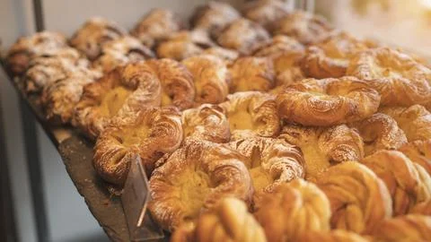 Various artisan small breakfasts sitting on a large shelf. Stock Photos