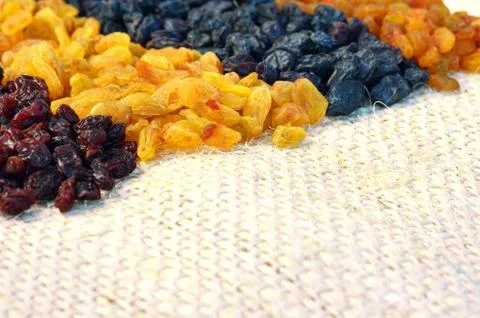 Various assorted raisins background Stock Photos