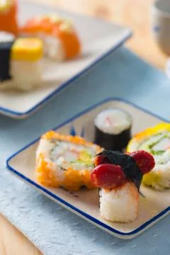 Various assorted sushi on a plate Stock Photos