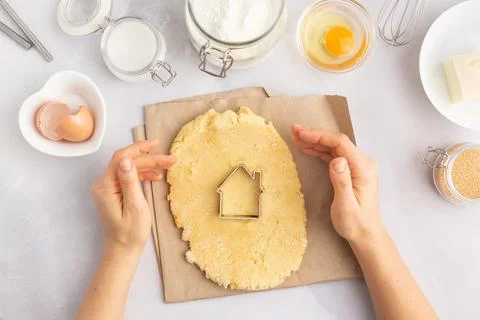 Various baking ingredients - flour, eggs, sugar, butter and kitchen utensils on Stock Photos
