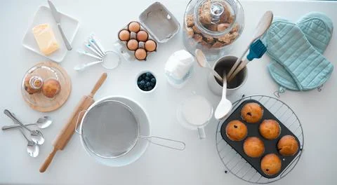 Various baking products on kitchen counter from above. Baking utensils on a Stock Photos