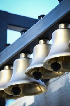 Various bells in a row Stock Photos