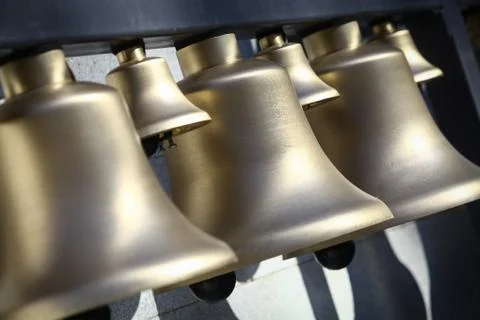 Various bells in a row Stock-Fotos