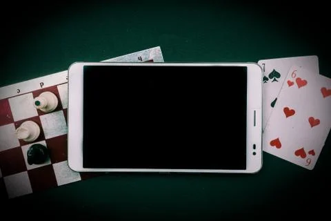 Various board games with tablet pc Stock Photos