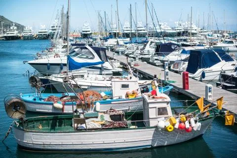 Various boats at rest in the marina Stock Photos