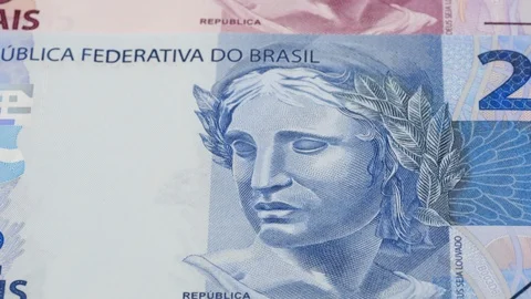 Various Brazil real notes tracking. Slider shot. Low angle, macro. 4K Video stock 125338070