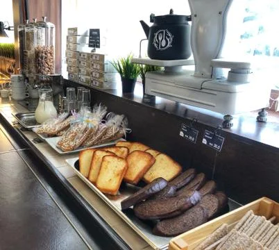 Various bread type on shelf in Bakery shop. Stock Photos