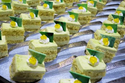 Various buffet cakes in a restaurant for dinner. Food concept. Stock Photos