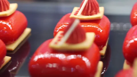 Various cakes in a store window. Stock Footage 239622598