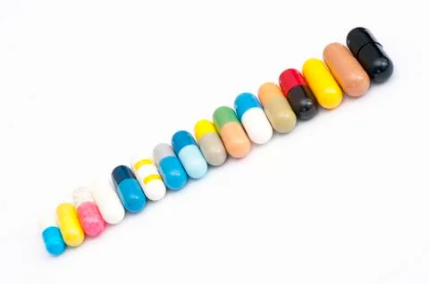 Various capsules in row Stock Photos