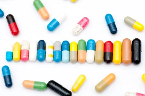 Various capsules in row Stock Photos