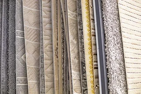 Various carpet samples with textures and patterns Stock Photos