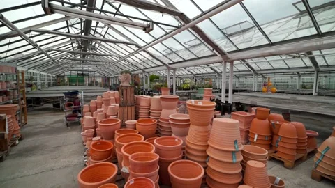 Various ceramic terra cotta pots in a DIY store. Stock Footage 213376354