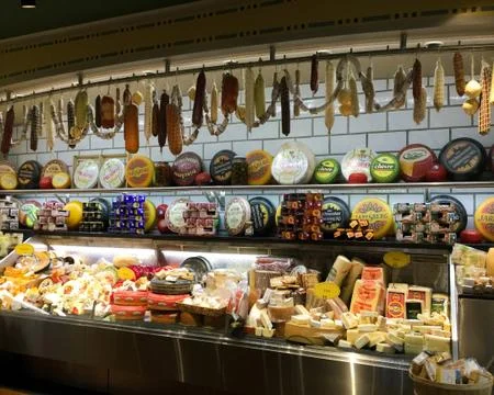 Various cheese display in cheese section of Eatzi's Market &amp; Bakery store Stock Photos