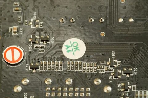 Various chips on a textolite video card board for a modern desktop computer Stock Photos