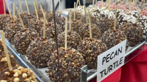 Various chocolate covered apples Stock Footage 329011311