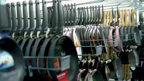 Various choice of cooking pot and pan on display in a grocery store. Stock Footage 248580168