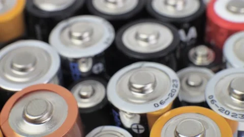Various Close up background of various alkaline batteries. top view Stock Footage 162846382