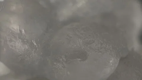 Various close up shots of ice cubes and a sparkling water pour 4k Stock Footage 213289987