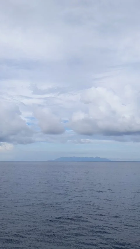 Various cloud patterns above the eastern Indonesian ocean Stock Footage 292336172
