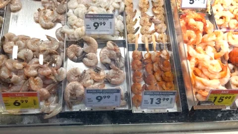 Various Cold Shrimp Available for Purchase - Grocery Store Stock Footage 137622663