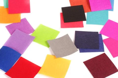 Various colors square felt samples for textile design Fotos de archivo