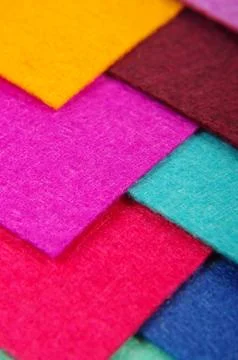 Various colors square felt samples for textile design Stock Photos