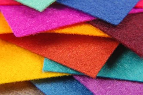 Various colors square felt samples for textile design Stock Photos