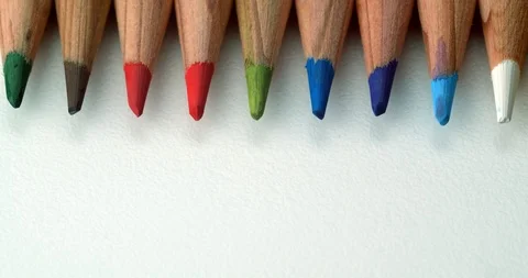Various colour pencils lined at top of frame Stock Footage 113143072