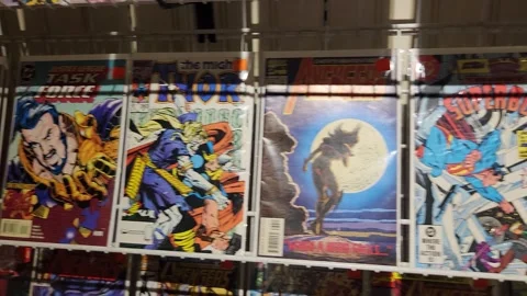 Various Comic Books Available for Purchase Stock Footage 243989752