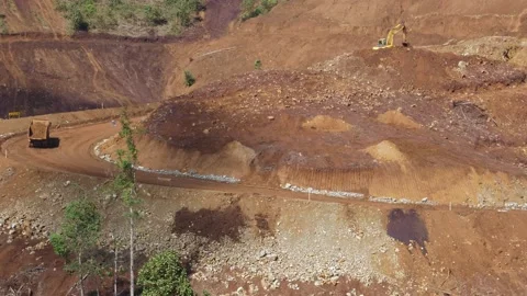 Various construction vehicles and trucks are busy at the construction site Stock Footage 132080508