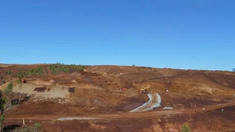 Various construction vehicles and trucks are busy at the construction site Stock Footage 132080586