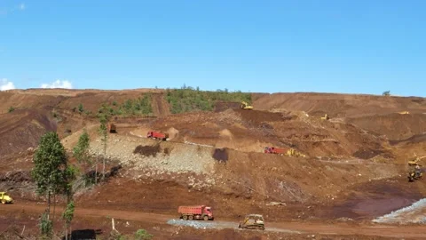 Various construction vehicles and trucks are busy at the construction site Stock Footage 132080598